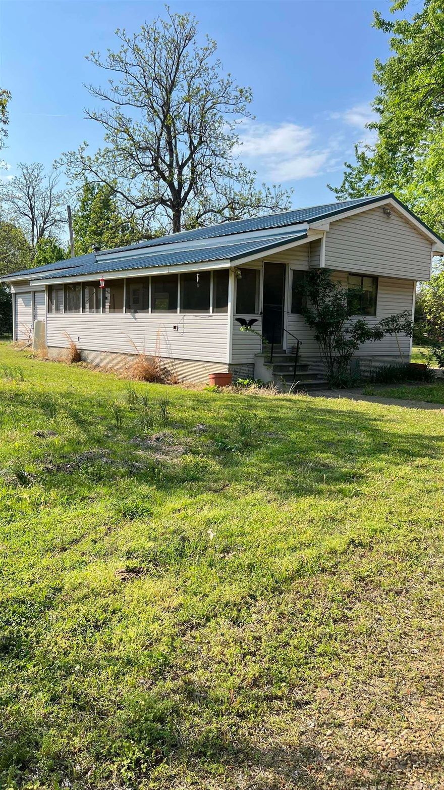 Approximately 14 acres located just south of Paragould on Hwy 69.  There are two 16 x 60 mobile homes on the property and two concrete block buildings. One of the mobile homes is a 2 bedroom/1 bath and the other a 3 bedroom/1.5 bath. The value is in the land-must see to appreciate!