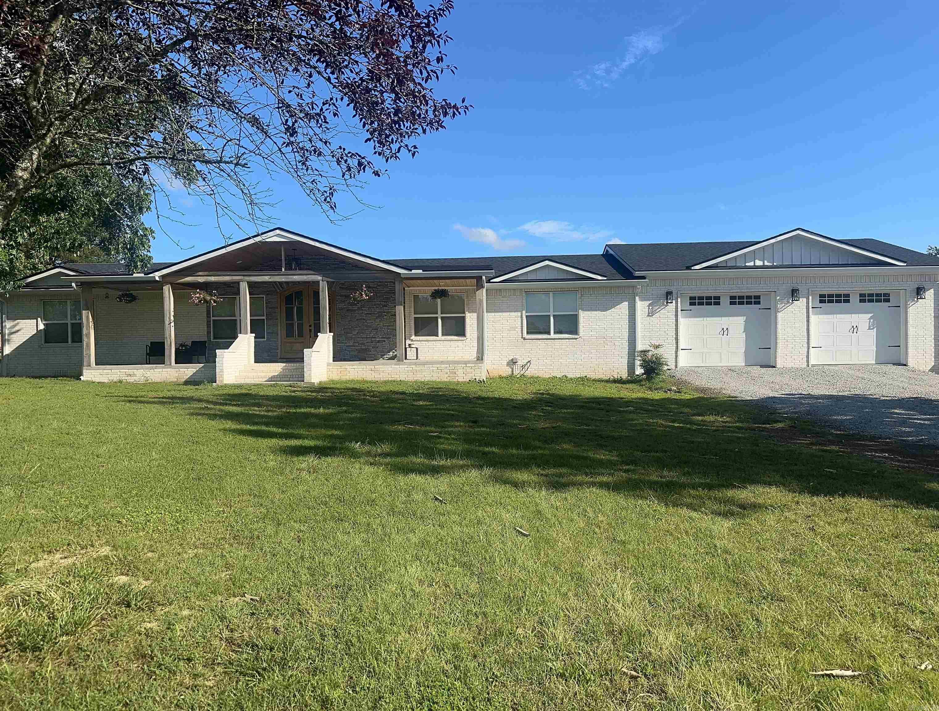 Looking for space and privacy for the FAMILY!!Check out this totally renovated 5bd/4ba home on a little over 2 acres. Survey is scheduled to be done asap. New sheetrock, electric, plumbing, spray foam insulation, 10" wood plank flooring, high-end appliances, (refrigerator stays), 2 HWH, Amana Heat Pump & duct work, fan/light in all bathrooms are LED with built in Bluetooth speakers. Grand entrance through the beautiful CUSTOM!! Double 8 ft. arched front doors, kitchen and dining area are open to the living area great for large gatherings. 30x32 SHOP with a basketball court for the kids!! You can also own your own little orchard peach, pear, apple, plum trees and also blueberry bushes. You won't find this type of home anywhere and you can't compare to a 1977 home!! Sellers took pride in the remodel it was meant to be their forever home.