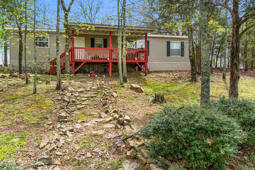 Welcome to Herbert Hill Drive! This charming double-wide home sits on 3.33 acres of serene land, offering breathtaking views and endless possibilities. Whether you're looking for space to relax, entertain, or enjoy nature, this property has it all. Don't miss the chance to make this peaceful retreat your own