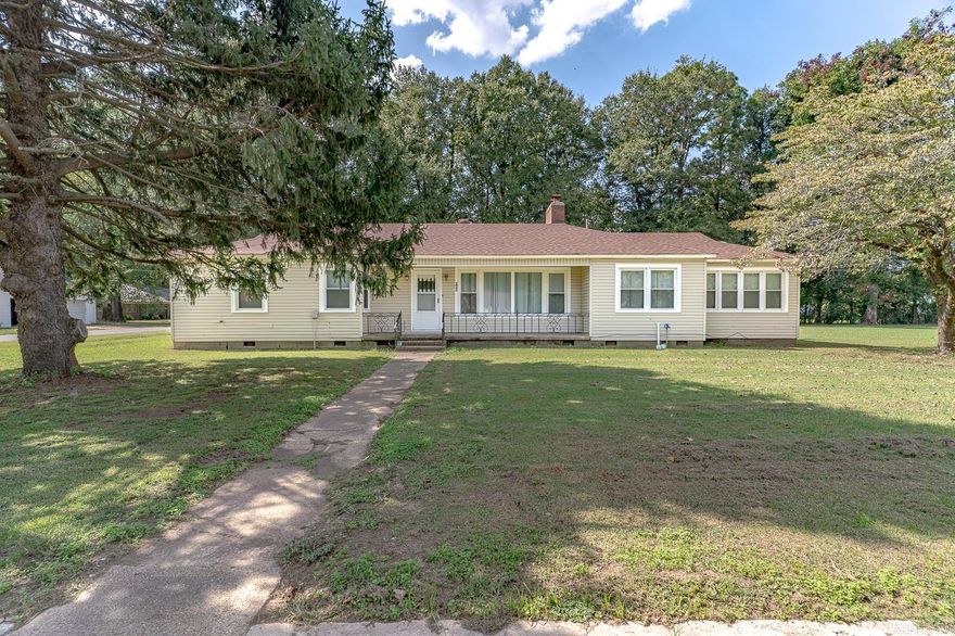 Welcome to Market 609 S Main in Leachville AR.  This 3-bedroom, 2-bath home is located on a spacious corner lot in the heart of Leachville, within the Buffalo Island Central School District. Recent updates include a refreshed kitchen and updated flooring. A large 2-car attached carport with storage provides both convenience and functionality. The oversized laundry room has plenty of space and was previously used as a home office, offering flexibility to suit your needs. Currently owned as a church parsonage, this home offers a warm and welcoming feel. Centrally located between Jonesboro, Blytheville, and Kennett, MO, this property combines small-town living with close proximity to larger communities. Call today to schedule your tour!