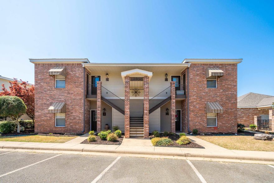 Live the Lake Life You’ve Always Dreamed Of! Welcome to your fully furnished, move-in-ready Lake Hamilton retreat! This beautifully updated 2-bedroom, 2-bath condo offers 1,144 square feet of stylish, low-maintenance living in the highly sought-after gated community of Bayshore Cove—where lake life meets everyday comfort. Step inside this upper-level unit and soak in the scenic lake views and relaxed elegance. Featuring hardwood and tile floors, 9-foot ceilings, and a modern kitchen with granite countertops and stainless steel appliances, this space is made for easy living and entertaining. Plus, enjoy peace of mind with recent upgrades like a new HVAC (2022), water heater (2023), dishwasher (2024), and refrigerator (2021). Just steps away from your door, you'll find the sparkling community pool, clubhouse, and boardwalk access to Lake Hamilton—perfect for tying up your boat for up to 7 days! You’ll also love the private boat launch, on-site boat/trailer storage, and the convenience of a temporary boat tie-up right next to the complex. Whether you're lounging poolside, boating at sunset, or enjoying nearby shops and restaurants, this condo offers the ultimate lake lifestyle!