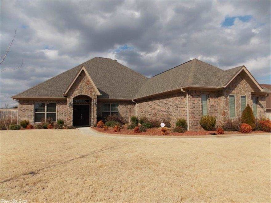 Beautiful custom built home with all the bells & whistles! Open floor plan. Kitchen has huge island bar w/high-end appliances including Frigidaire Professional refrigerator. Awesome master suite has enormous closet and bath with custom double vanity, jetted tub, and separate shower. Office with built-ins. Safe room. Sparkling in-ground pool, patio, play area, custom outdoor lighting, landscaping, sprinkler system. More fine features than there is room to list them.  Extremely energy efficient. A must-see!