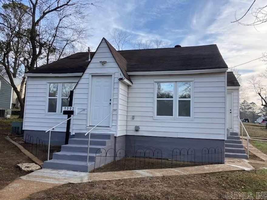 Affordable 3br/1.5ba on a corner lot! This home features two bedrooms and one full bathroom downstairs and a converted attic space upstairs that contains a half bath plus an area currently designated as a bedroom but could be an office, etc. Upgrades to the home include new windows, doors, LVP floors, water heater, paint, lighting, receptacles, new attic insulation and more.