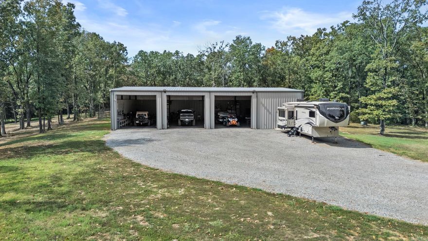 Work here, play here, live here! This one-of-a-kind barndominium sits on 12.77 acres just minutes from the city limits of Searcy offering approximately 1920 sq ft of H/C living space, 4800 sq ft of insulated H/C shop space.This red-iron building perfectly blends, comfort and function. Inside its all about the details-crown molding, custom cabinetry, wall ovens built-in grill,  spa-style shower. Outdoors, you'll find an in-ground pool, fenced yard and an 8 x 12 storage building with electric. Perfect for downsizing or retirement living, with space to expand if desired. Private and peaceful setting close to everything.