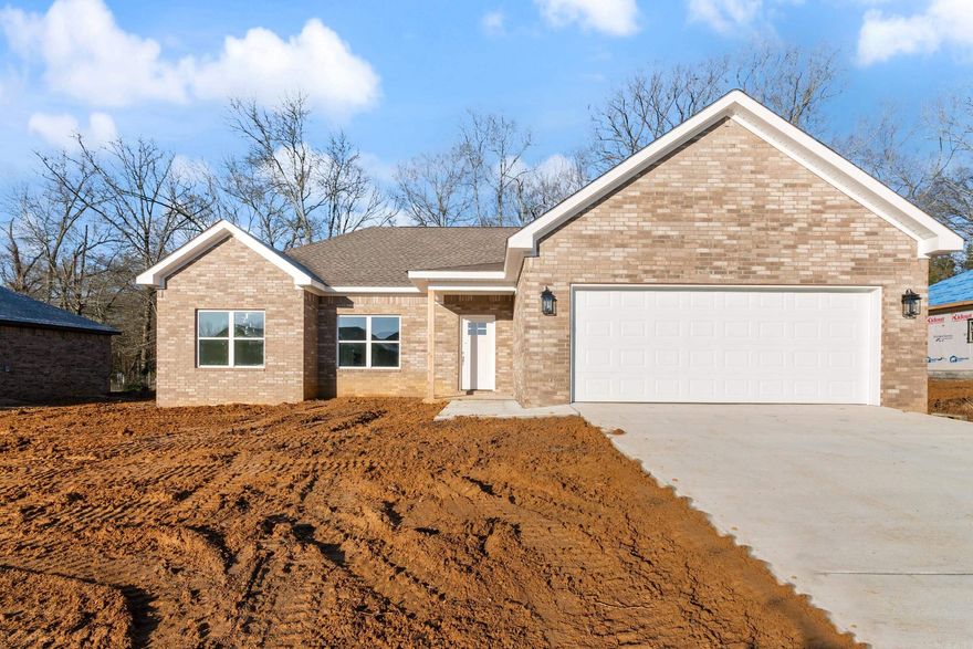 Discover your dream home in the heart of Wooster, conveniently located across from Wooster Elementary. The open-concept kitchen features stunning granite countertops, backsplash, and stainless-steel appliances, complemented by a walk-in pantry. Cozy up by the electric fireplace in the spacious living room. The home also features a tiled walk in shower in the primary bathroom, as well as a walk in laundry room. As an added bonus, fiber internet is now available in this area!