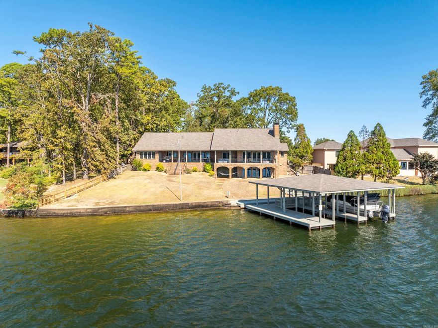 Main Channel Lake Home with views of wooded Entergy Islands, no Neighbors across the Lake, Nicely Updated, Great Floor Plan, Move in Ready, All Furnishings negotiable, Full home Kohler Generator, Geothermal Cooling/Heating from Lake, Lakefront faces South, Quality Fixed Pier two stall boat dock, with lift & swim dock, Additional lakefront deck area for Sunning, Great Location by Lake and Land!, Right off of Central Avenue (7-South).