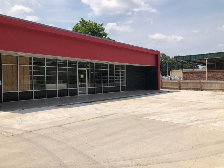 TOTAL NEW CONSTRUCTION ON THIS 2310 SQ. FT. BUILDING IN THE HEART OF LONOKE.  FORMERLY A TOBACCO STORE AND CONVENIENCE STORE.  TWO GAS TANKS HAVE BEEN CAPPED OFF AND ARE NOT FUNCTIONAL.  NEW PARKING LOT, GREASE TRAP, HEAT/AIR, DRIVE THRU, WALK IN COOLER WITH MULTIPLE GLASS DOORS, ROOF, SHEETROCK, PAINT, 2 NEW BATHROOMS, FULL KITCHEN, PHASE I AND II REQUIREMENTS INSPECTED BY CITY.  FORMER BUSINESS HAD BURNED AND OWNERS BUILT BACK. GREAT LOCATION AND OPPORTUNITY FOR AN INVESTOR OR BUSINESS OWNER.  PRIME LOCATION!!!