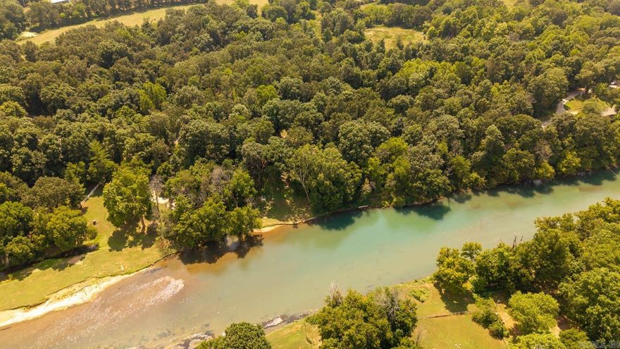 Land For Sale Near the Spring River - Spring River View This 0.44 acre property offers an incredible location with both city water and electricity available, making it an ideal site for your dream home, weekend getaway, or investment property. The land offers a view of the Spring River and sits less than a mile from a public access point, giving you easy entry to some of the best trout fishing in the region, along with kayaking, floating, and year-round recreation. The property is a blank canvas that is ideal to build your primary residence or a river lifestyle getaway! Just one mile from Mammoth Spring State Park, you’ll be near one of the largest natural springs in the U.S., featuring walking trails, historic sites, and family-friendly activities. The charming town of Mammoth Spring provides local dining, shops, and conveniences, while the surrounding Ozarks offer endless opportunities for exploring nature. With utilities nearby, a scenic view, and prime location, this property is perfect for those who love the outdoors yet want town and highway access close at hand.