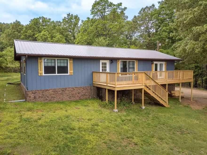 Riverside Retreat & Turnkey Investment Opportunity! Discover the perfect blend of Ozark charm and income potential at 35 River Bend Rd. This beautifully remodeled 4BR/3.5BA ranch-style home sits just steps from the crystal-clear Spring River and currently operates as a high-performing Airbnb. Boasting approx. 2,350 sq. ft. of living space, the home features a bright 1,400 sq. ft. main floor with high-end finishes and an additional 950 sq. ft. finished basement perfect for guests.  Enjoy "fabulous" river views from the front porch or entertain on the large rear wood deck. The property is sold fully furnished with all appliances included (range, microwave, dishwasher, fridge). Situated on a large lot, the exterior includes a 2-car open garage and a substantial storage building/shop for all your gear.  Location Highlights: Just one block from the Lassiter Walk-In Access & boat ramp for world-class trout fishing, kayaking, and canoeing. Minutes from the world-famous Mammoth Spring State Park and local amenities in Mammoth Spring and Thayer. Whether you're seeking a primary residence, vacation home, or a turnkey rental with proven history, this property is priced to sell!