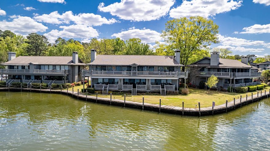 This Beautiful Farr Shores Condo Offers 3 Bedrooms, 3 Full Baths and 180 Degree Views of Lake Hamilton. It has been CompletelyRemodeled with Quality Materials and True Craftsmanship... AND it is Selling Fully Furnished! 2 Units were Combined to Create OneAmazing Lakefront Home! From the Walls of Windows to the Oversized Waterfront Deck, the Views will WOW you! Covered Boat Dock.Pool. Tennis Courts. Beautiful Grounds. It is Even Better in Person...