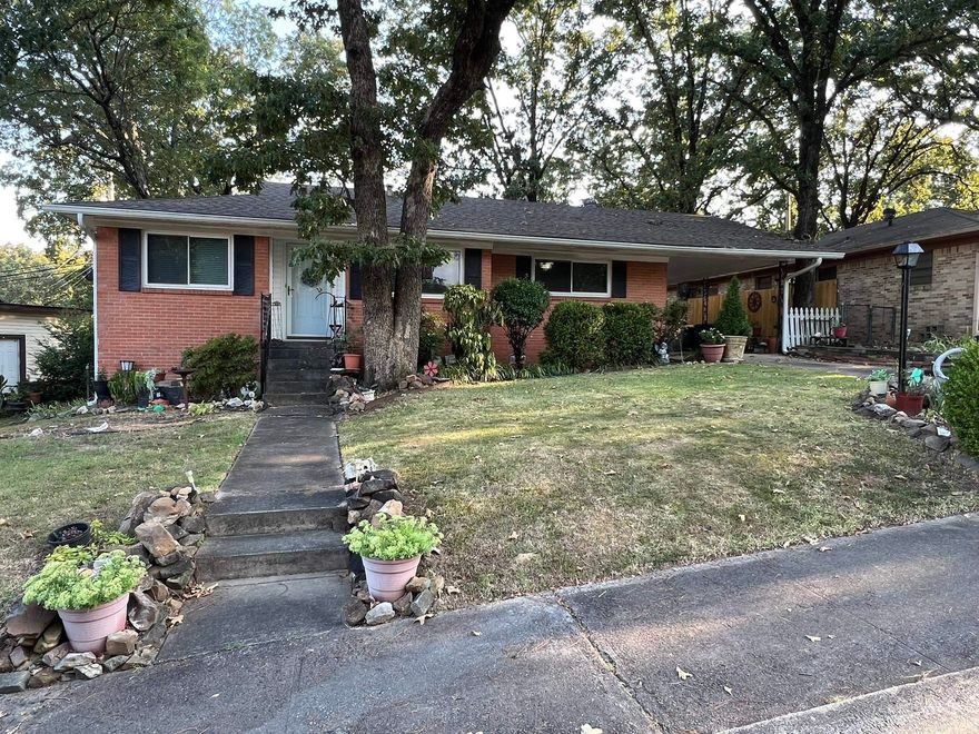 Nice 3-bedroom, 1.5-bath brick home with a well-designed floor plan. Features a spacious eat-in kitchen with a quality 5-burner gas stove and dishwasher—both approximately 3 years old. Hardwood floors are found throughout much of the home. The large living and dining area offers a flexible and inviting space, perfect for entertaining or relaxing. Over the years, the seller has made key updates, including electrical wiring, windows, and vinyl siding. Additional highlights include a small basement area (accessible via crawl space), a large storage room off the carport, and a new architectural roof installed in November 2019. Seller providing a 1-year First American Home Warranty.