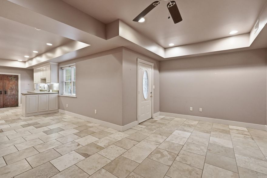 Spring Park Manor Unit A is a 3 story townhouse offering a unique downtown opportunity on the corner of iconic Spring Park. Ground floor includes living room with fireplace & ceiling fan + kitchen w brkfst bar &  half bath. There's also a fenced patio off the living room that's perfect for a small pet. The 2nd floor suite with fully renovated bath enjoys tile shower & floors as well as tub. 3rd floor has great mountain views. Amenities feature ample closet space & private bath w tile shower & floors. Design details in this home include elevator access + extra wide staircases w tile & hardwood floors throughout. Zoned climate controls supported by 2 HVAC units for central heat & air ensure year round comfort.  There's also covered entry, private patio, balcony overlooking the park and detached, assigned parking. Proximity to Greer's Ferry Lake, Little Red River, Eden Isle, & Sugarloaf Mountain make this well thought out home the perfect spot to enjoy all lake life has to offer including easy access to 3 golf courses, world class trout fishing, dining, shopping, & healthcare. Walk to cafes, boutique shopping, banking, and the Gem Theater