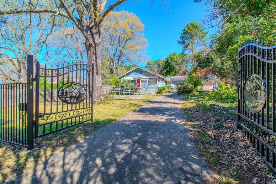 Great opportunity to purchase a wonderful updated home with over an acre of land in Benton!  This three bedroom, two bath updated home, has two separate living areas, and an outdoor living area that is amazing!  The primary bedroom has an updated bathroom that features an EPLO remote with a top-of-the-line bidet (cost over $1000).  There is also a bonus room that could be a fourth bedroom.  There is a private gate and fenced back yard.  This home has a huge above ground pool, an expansive deck, gazebo and barn.  Outside there is a 50 amp RV hookup and 30 amp RV hook up.  The home also includes solar panels. Refrigerator, washer, dryer and microwave convey.  With an acceptable offer, Seller is willing to convey all furnishings.  Whether you are an investor looking to expand or an individual searching for privacy with convenience to shopping, this property has it all!  Call today to schedule a personal tour!  Agents See Remarks.