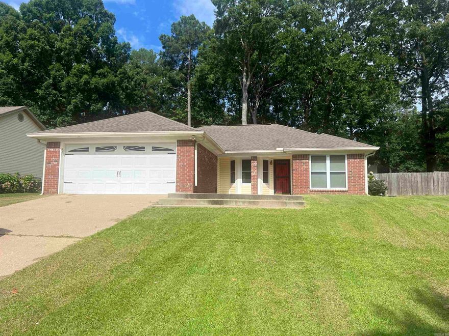 Charming and well-maintained, this 3 bedroom, 2 bath home offers a desirable split floor plan on a large lot. Enjoy cozy evenings by the wood-burning fireplace in the spacious living area. The home features a generous master suite, a convenient laundry room, and a two-car garage. With plenty of space inside and out, this property offers comfort, functionality, and room to grow. Located in a rural development eligible area.