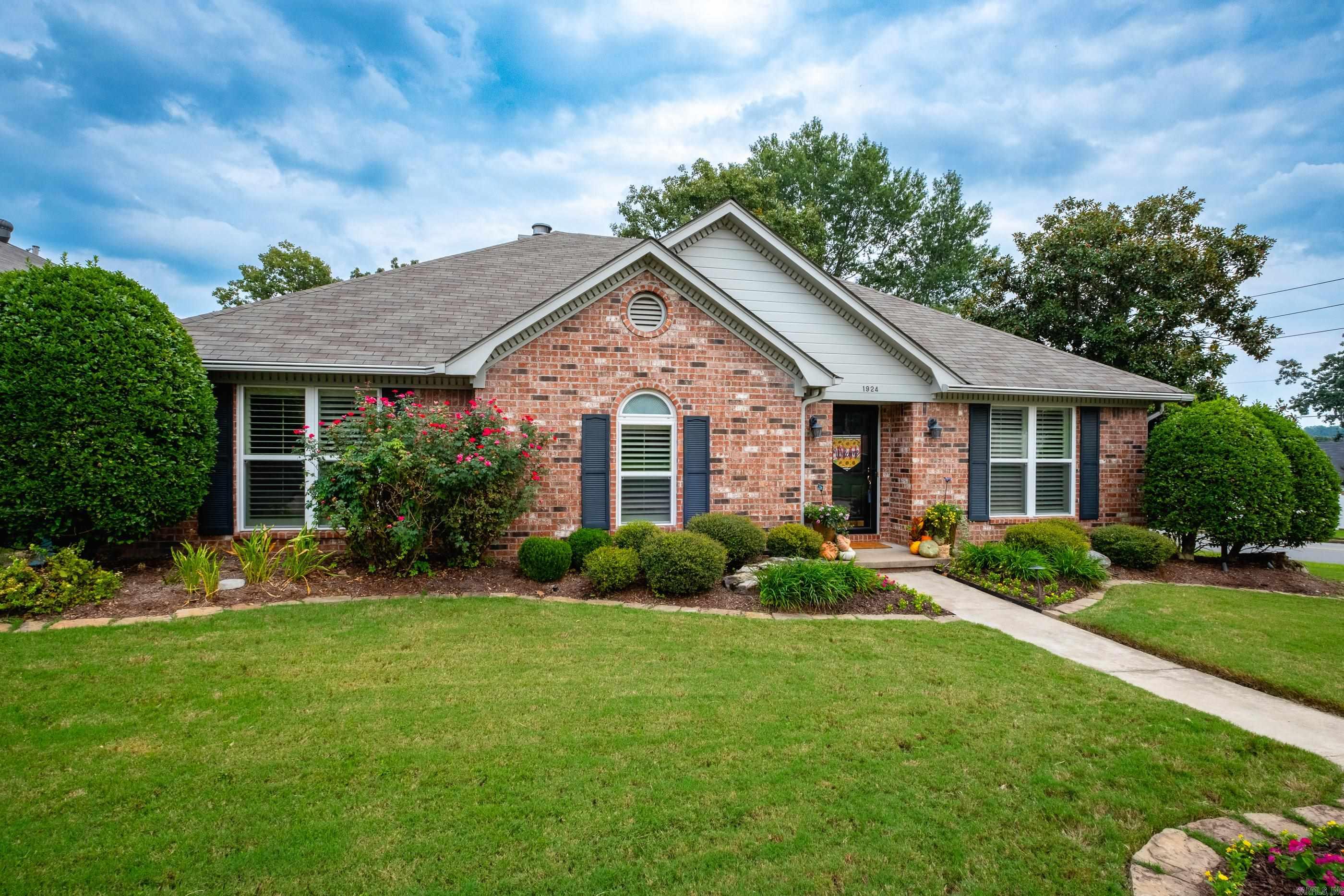 This stunning one-level brick residence offers the perfect blend of comfort and style, featuring 3 spacious bedrooms and 2 and a half well-appointed baths. As you enter, you’ll be greeted by a vaulted ceiling in the great room, flooding the space with natural light and creating an inviting atmosphere for both relaxation and entertaining. The beautifully landscaped corner lot provides a serene backdrop, enhancing your outdoor experience with a private backyard—ideal for gatherings, gardening, or quiet evenings under the stars. Convenience is key with a side-load two-car garage, ensuring easy access while maintaining the home’s aesthetic charm. A separate laundry room adds to the functional layout, making daily chores a breeze. This exceptional property is not just a house; it’s a place to call home. Don’t miss your chance to own this beautifully maintained gem! *Agents see Confidential Remarks*