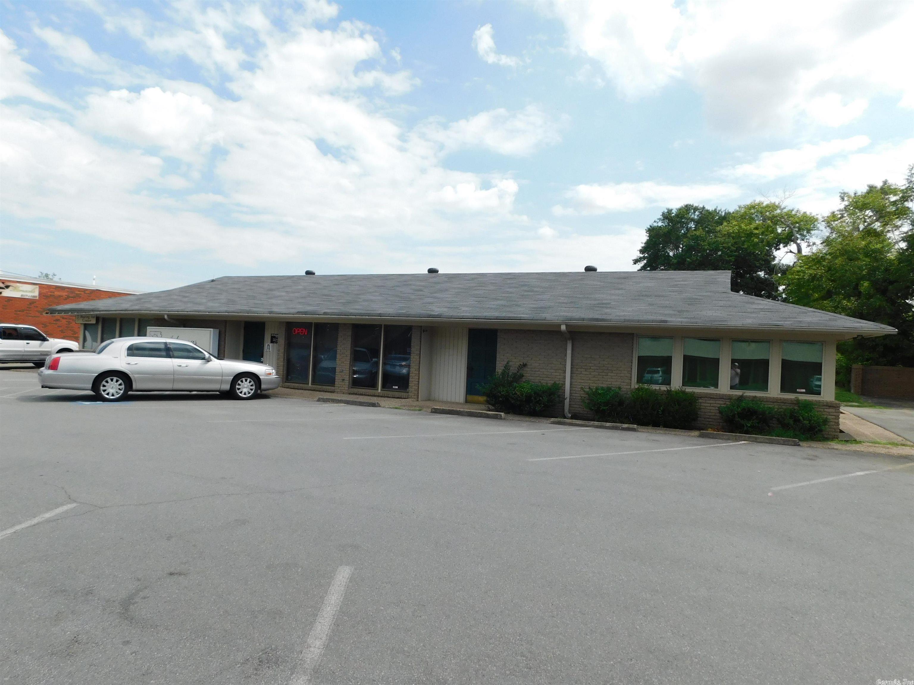Nice office building in North Little Rock! The left side is occupied by a long term hearing lab. The right side has had a doctors office in it for years, but is now vacant. We are leaving it vacant for now in case a new owner wants to occupy it and for ease of showing. Ample front door parking and a three year old roof. The two units are 2532 sf +/- in total. Each one is about the same size and divided into offices and exam rooms. Please call me for showing instructions and information. The right side of this property is also for lease please contact listing agent for details for details.