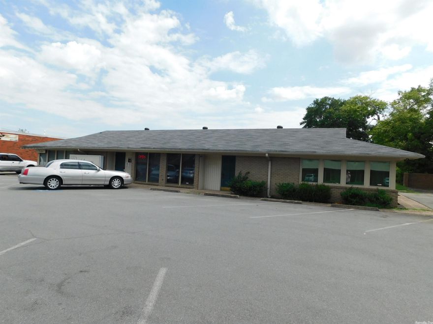 Nice office building in North Little Rock!  The left side is occupied by a long term hearing lab.  The right side has had a doctors office in it for years, but is now vacant.  We are leaving it vacant for now in case a new owner wants to occupy it and for ease of showing.  Ample front door parking and a three year old roof.  The two units are 2532 sf +/- in total.  Each one is about the same size and divided into offices and exam rooms.  Please call me for showing instructions and information.  The right side of this property is also for lease please contact listing agent for details for details.