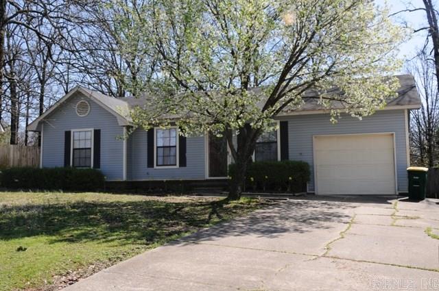 Great little home in prime location for commuting to LR or the Airbase. Large tree covered privacy fenced backyard, backs up to green space, 12x12 deck and partially finished storage building. Extra storage off garage, laminate flooring thru out open floor plan. Fridge conveys with acceptable offer.