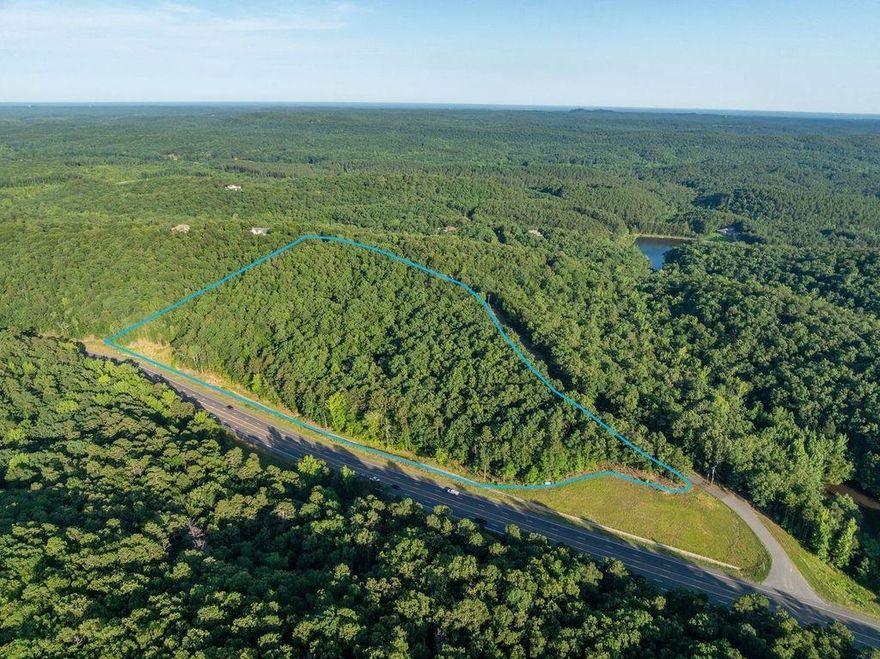 Location, Location, Location just off Hwy 70 East! In Gated Subdivision!! This beautiful wooded acreage has approx. 11.22 acre and is on paved road. Private financing available for qualified buyer with large down payment. Don't miss this great opportunity to build your dream home.