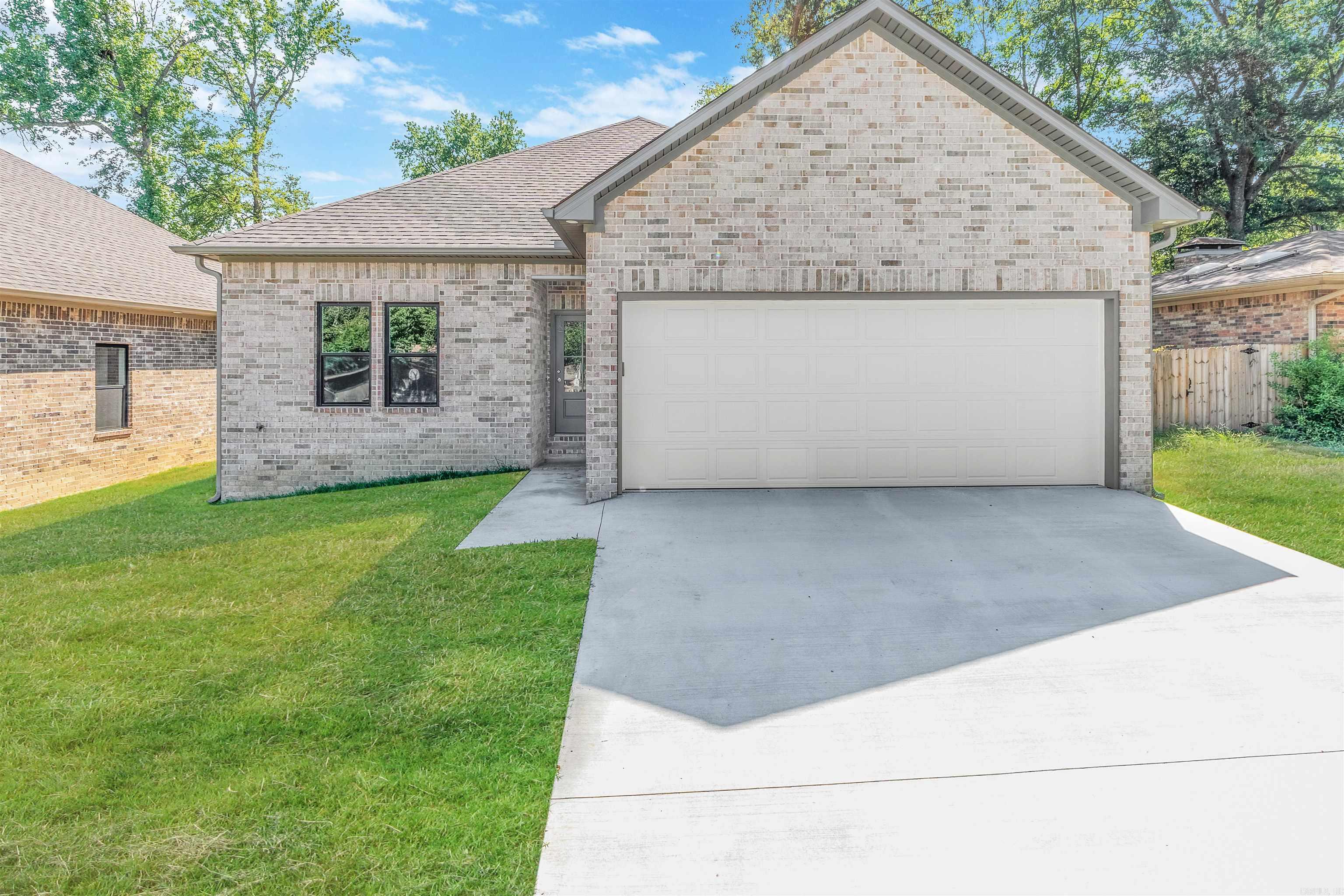 Get ready to fall in love with this NEW CONSTRUCTION home in Jacksonville! Spacious and flowing, one room leads to the next with a half wall between the living room and kitchen. Beautifull toffee-colored all-wood cabinets, solid-surface countertops, and 9' ceilings will make you want to stay in this wonderfully convenient spot between Little Rock AFB and the interstate! Completion SEPT 2025!! Perfect timing for your autumn pumpkins and warm decor! Agents, please see Agent Remarks!