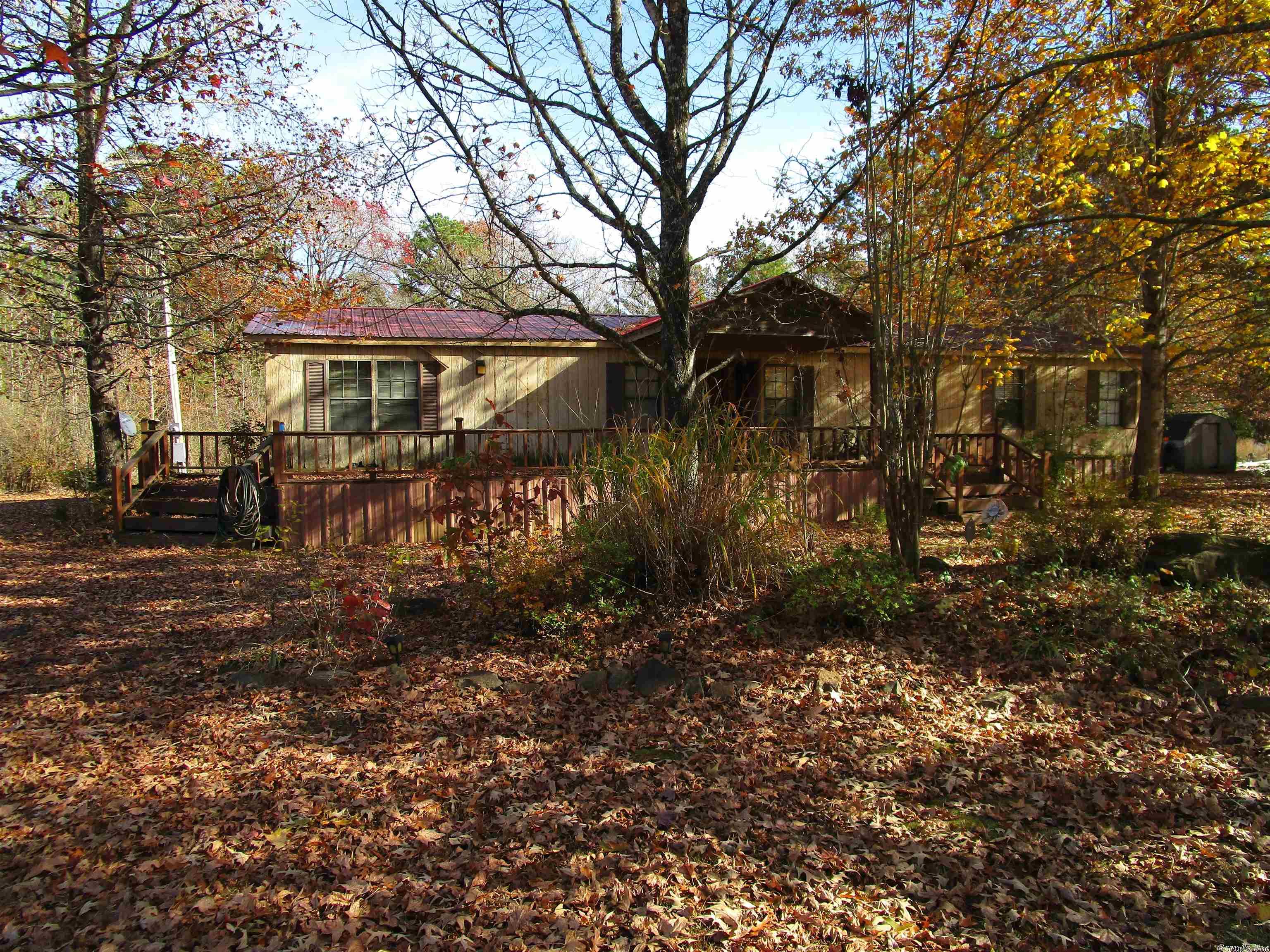 A lake house with plenty of room for you and company! Sold AS IS.. With a little TLC it can be all you want it to be. Don't miss out on the perfect place between all the boat lanching spots and local dining. It's a peaceful lake place.