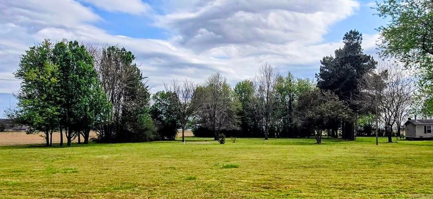 Great building site! Large 1 acre lot in city limits with utilities ready for you to build your next home!