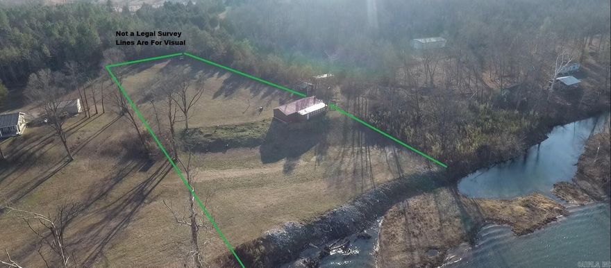 Escape to this inviting 2-bedroom, 1-bath cabin with private frontage on the pristine Eleven Point River. Situated on 2 open acres, the property offers easy river access for kayaking, canoeing, boating, fishing and swimming—perfect for weekend getaways or year-round living. Enjoy bright, airy living spaces, a cozy cabin atmosphere, and wide lawn and meadow areas ideal for outdoor entertaining, gardens, or RV/parking. Peaceful, private, and scenic — a rare riverfront opportunity to own recreational paradise on the Eleven Point.