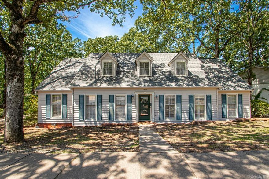 A very welcoming home on large lot with wonderful lake views.  This beautiful property features a spacious layout with 4 bedrooms & 3 full bathrooms, den with fireplace, formal living room, formal dining room, lovely screened in porch off of the kitchen, backyard deck perfect for entertaining and a very unique garage space.  See Remarks