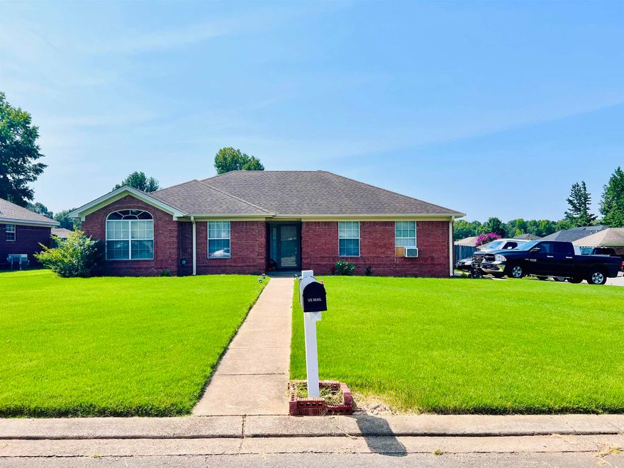 Beautiful brick home sitting on a large corner lot! Great Location**Established Neighborhood**Great Price**Easy Access to Interstate and Shopping**Spacious living room with tray ceiling, gas log fireplace, and foyer with a coat closet. Large master bathroom with two closets, double vanity, an enclosed water room. Wood flooring in the living room and one bedroom, carpet in two bedrooms, and ceramic tile in the kitchen, bathroom and by the doors. Window unit in the garage! Check out the Huge fully fenced backyard with storage! Seller is giving the buyer $1,000 for paint allowance at closing. The above ground pool does not convey with home. The partial fence will be repaired before closing. Make your appointment today