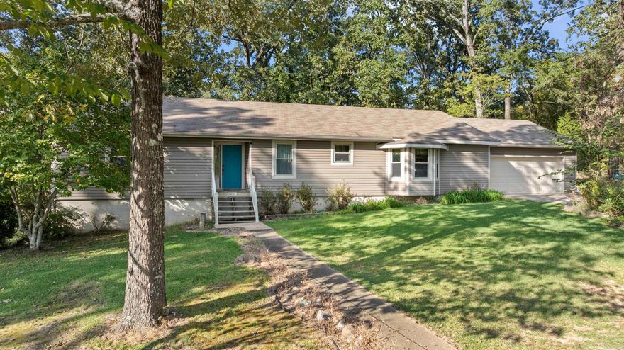 This home is surrounded by woods!! Has 30 x 60 mental building and 30 x30 barn. Great room has wood burning fireplace. Has office and a second living area that can also be a 4th bedroom. . All Electric, natural gas is available.  Kitchen new dishwasher, Jen air range and pantry cabinet. Primary bedroom walk in closet. has large shower. Other two bedrooms share bathroom. Covered back porch, under house has work area or storage. Has RV 50 amp and generator 30 amp hookup at end of house. Roof is 10yrs old, has all new windows. New siding and gutters in 2018