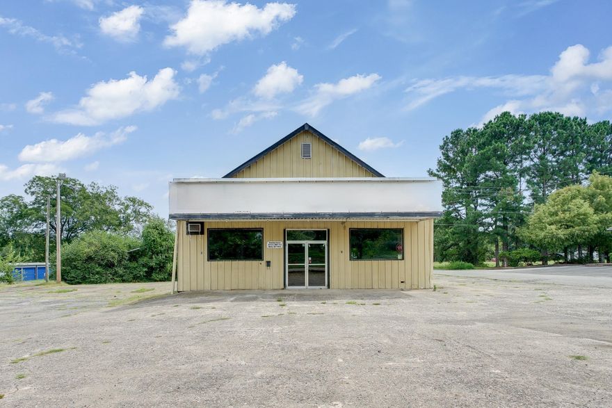 This is almost an acre of property bordering Hwy 71 with Hwy frontage right in the middle of Mena & close to WalMart. The building is older and needs repairs. Or tear the building down as the location of this land can’t be beat! It would be a perfect spot for a new business or new restaurant or many other uses! The possibilities are endless!