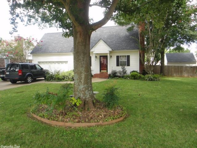Don't miss this opportunity to make this beautiful house in River Oaks your home. This home has it all - curb appeal, backyard landscaping w/ sprinkler system, full privacy fence. Deck is perfect for BBQs. Master Bedroom and bath downstairs w/ two walk-in closets. Original hardwood floors on first floor. Formal dining room, fireplace and both bedrooms upstairs has their own walk-in closets, bonus room and lots of storage. 14x16 insulated & wired shop w/storage.