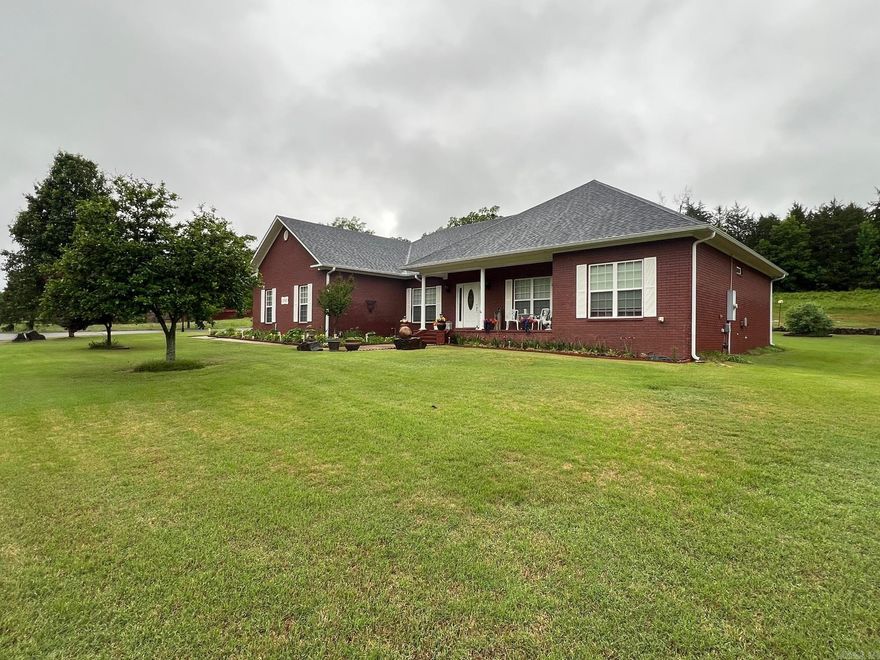 Very nice four bedroom two bath brick home in gated subdivision in Morrilton. Hardwood floors and granite counter tops throughout. Split Floor Plan House has a nice covered porch / outside living area.