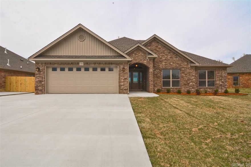 Another quality home built by Enchanting Homes. Quality construction in every detail. Open plan with corner fireplace, sun room/dining, coffee station. Walk-in pantry, granite counter tops, gorgeous cabinets, master bath has granite counter tops, jetted tub, dual sinks and closets stair to attic.