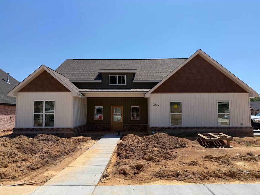This new construction home on a corner lot in Creekside offers the perfect blend of traditional charm and modern style. Thoughtful details like accent walls, custom trim, vaulted ceilings, and high-end finishes create a bright, welcoming feel throughout. The open layout centers around a beautiful kitchen with custom cabinetry, stylish countertops, and a gas range, flowing seamlessly into the living room with a cozy gas fireplace. The split floor plan provides privacy, with a conveniently located half bath for guests. Enjoy the covered back patio and side-entry garage.