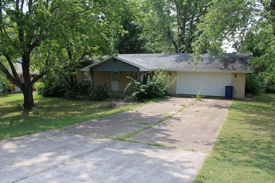 You will love the convenient location! This three bedroom, 2 bath home is located minutes from the hospital, banks, schools, employment and shopping! Fenced back yard, spacious living room, sunroom, and a covered front porch! Call today to schedule a look.