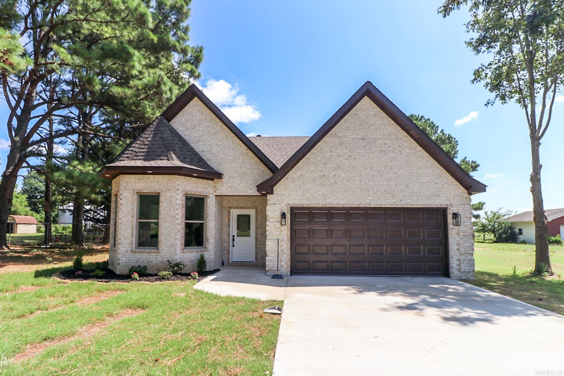 Located in Valley View, this new construction home on 1.08 acres has an open and light filled interior. It is a clean white canvas for new owners to paint with their style. Gorgeous Bernini Avorio polished porcelain tile floors throughout and 11 foot ceilings in the main living give the home a sleek, modern style. Other features include granite counters in the kitchen and baths, a large walk-in tile shower and corner spa tub and custom closets throughout.