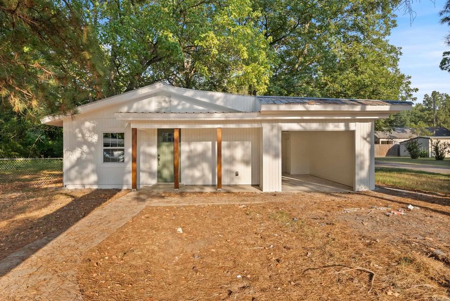 What a great home at a great price! Here are just a few of the NEW things you'll get with this home: New windows, new paint, new luxury vinyl flooring, new fixtures, new appliances, new granite countertops, new HVAC condenser, and so much more! This corner lot home has great curb appeal, situated under mature shade trees and with a cozy front porch to welcome you home. Covered carport with a large side patio that is perfect for outdoor entertaining. Great floor plan with the dining area open to the living room. Beautiful granite countertops in the kitchen with all new appliances. Metal roof, which could help with insurance costs. Great location in Newport with easy access to Walmart and restaurants. Call your real estate agent to schedule a private showing today! Some photos are virtually staged.