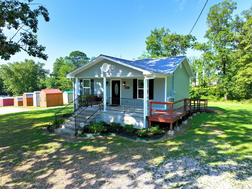 Discover this charming 720 sq ft commercial building, built in 2013, situated on a spacious 1.07 (approx)-acre lot with an additional 1.42 (approx)-acre wooded lot behind. Boasting approximately 281 feet of highway frontage along Highway 7, this property is ideally located near the intersection of Highway 84 and Highway 7, ensuring excellent visibility and accessibility. This versatile space is perfect for a variety of businesses, including a turn-key law office, retail store, or professional services. The building features modern amenities and a welcoming layout, ready for you to make it your own. The prominent sign out front is wired for electricity, providing additional exposure for your business. Don’t miss this unique opportunity to invest in a prime location with room for expansion!