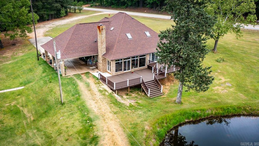 Custom built home on 18.5 acres, 2 large decks overlooking large pond, smaller pond on west side of house, 40x45 shop with loft and 3 bay doors. Probably the prettiest place in Nevada county!