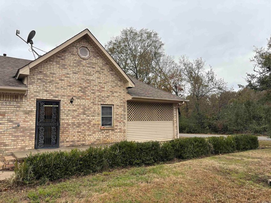 This listing is for 2 parcels.  Home is being sold "as is" and needs numerous updates.  No property disclosure.  Listing includes an additional parcel vacant lot that is inside the fenced area. It measures 120' x 120' according to the county records. This property has so much space inside.  Also, a bonus room upstairs could be finished out.  Huge carport area. Nice fence.