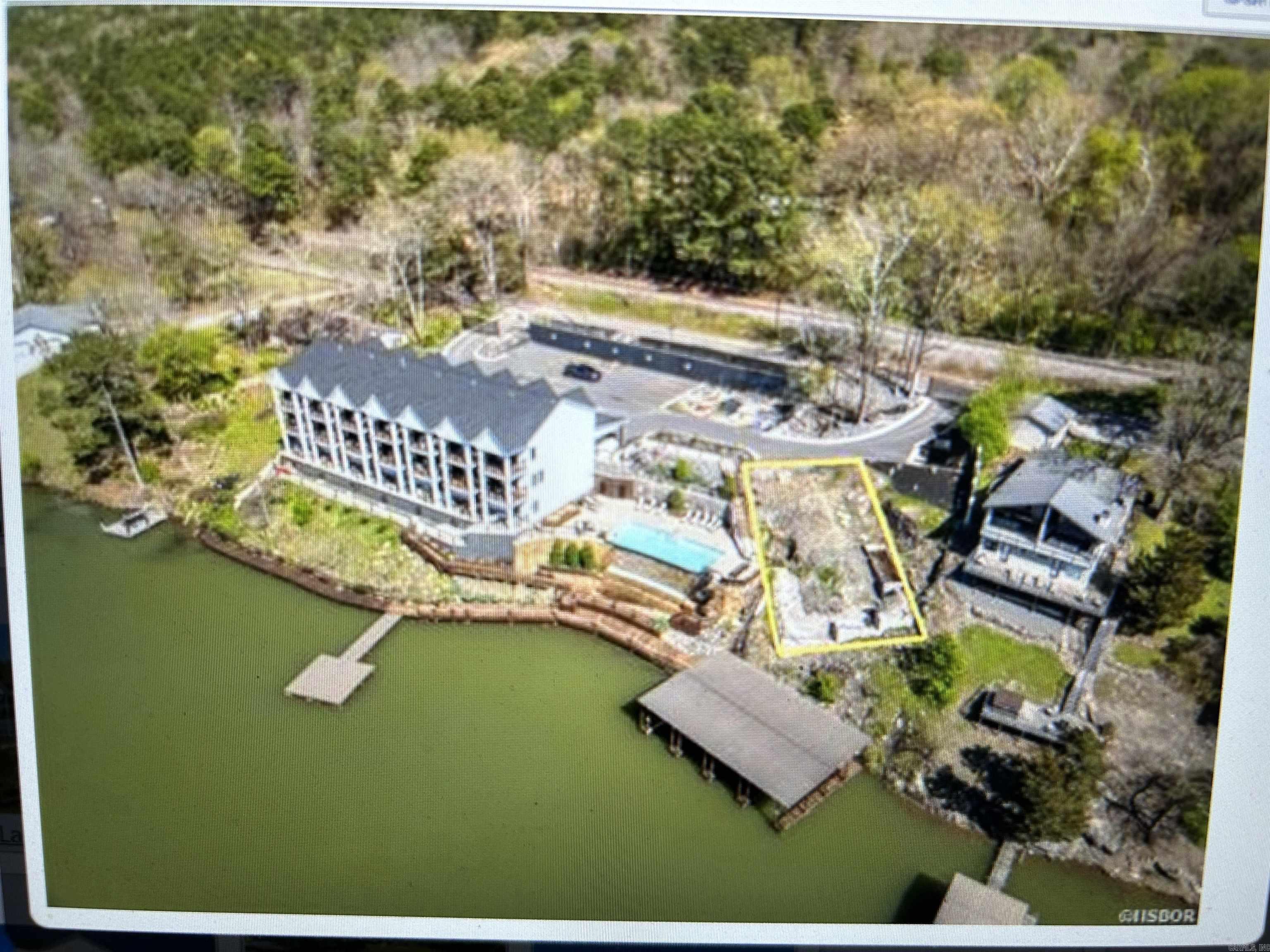 Lake Hamilton waterfront development lots AND Covered Boat Dock...SITES ARE APPROVED FOR NIGHTLY RENTALS AND DO NOT FALL UNDER THE CITY'S LIMIT!...This property consists of (1) covered boat dock and a 40'x60' building footprint approved for 1 or 2 buildings...This site is located immediately adjacent to the infinity pool/waterfall and fire-pit...***It is possible to build only 1 unit on this site....This property is on Short Term Rental Row (STR) - STR properties in this area are valued from $500k to $3M! This property is directly across the lake from Cajun Boilers restaurant. Walk to numerous family fun spots: putt-putt golf course, go kart track, bumper boats, kids' arcade, laser tag, Dominoās Pizza, and even a huge liquor store! Less than 10 minutes to Oaklawn Casino & Racetrack, Historic Downtown Hot Springs National Park, The Alligator Farm and Northwoods World-Class Mountain bike trails. This is the BEST STR sight available on Lake Hamilton! Owner / Agent...Plat on file