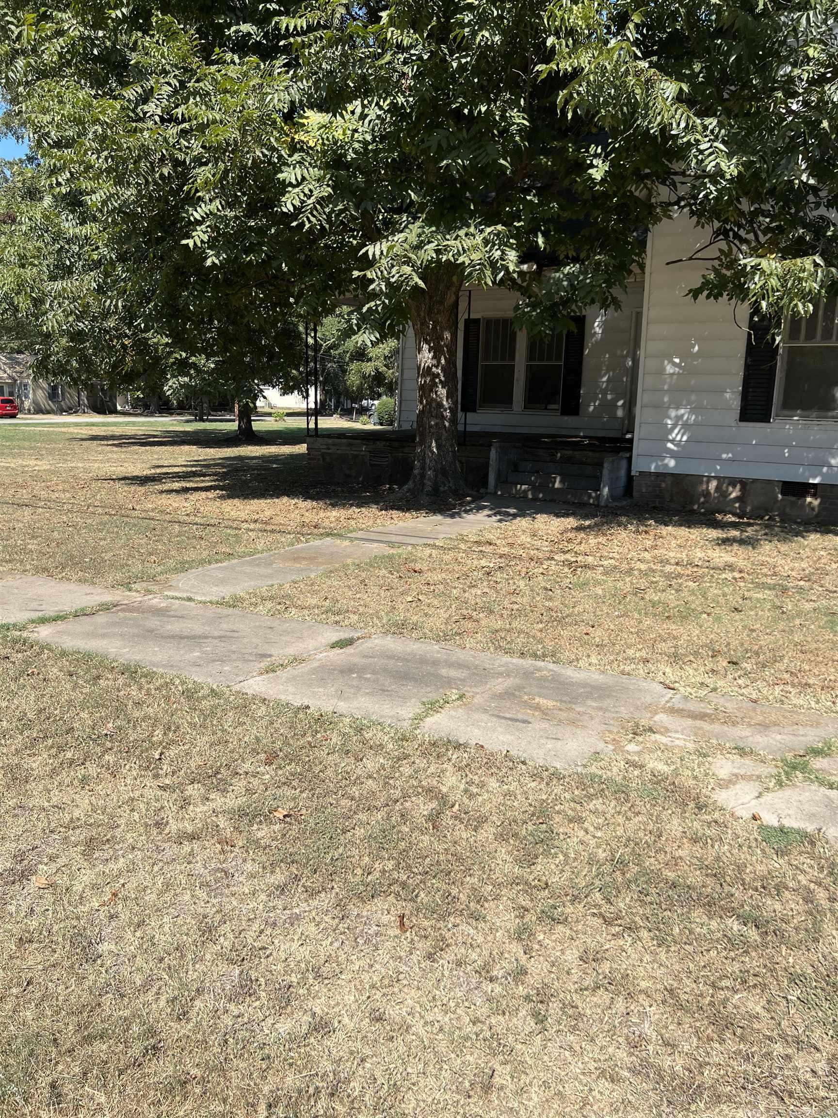 Great potential for this property within close proximity of schools. Two separate parcels on this property, one has home which is in need of repairs with large lot. Another lot would be perfect for new construction. Property being sold as is. No sign on property. Call today for you personal tour. Mineral Rights do not convey. SEE AGENT REMARKS