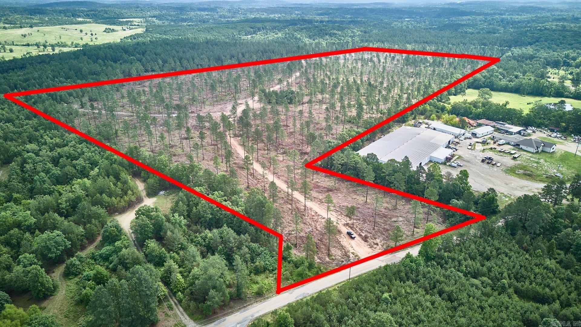 This 88.48-acre tract features utilities at the road, a pond, roughly 20 pine trees per acre, and a sturdy road bisecting the property for easy access via Pitchercane Road! This parcel is just minutes from Hot Springs Village and Hot Springs National Park and less than an hour away from Little Rock. The gently rolling landscape meshes perfectly with the well-placed road, creating the perfect set-up for new development! It is ideal for building a home or business or for recreational activities such as hunting, hiking, biking, and ATV riding. Don’t miss out on this opportunity – give us a call today!