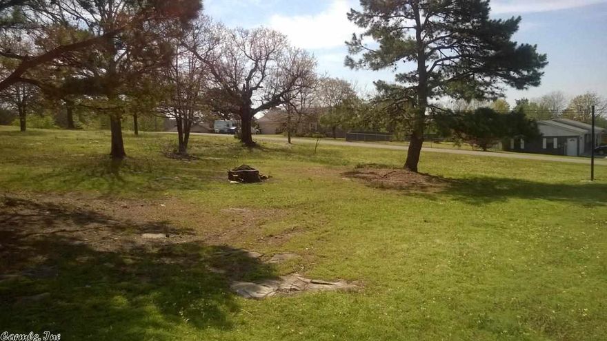 Enjoy a little bit of elbow room with this home just outside city limits. Home features 3 bedrooms, 1 bath with plenty of room for the kids and pets to play outside on it's .94 acre corner lot.