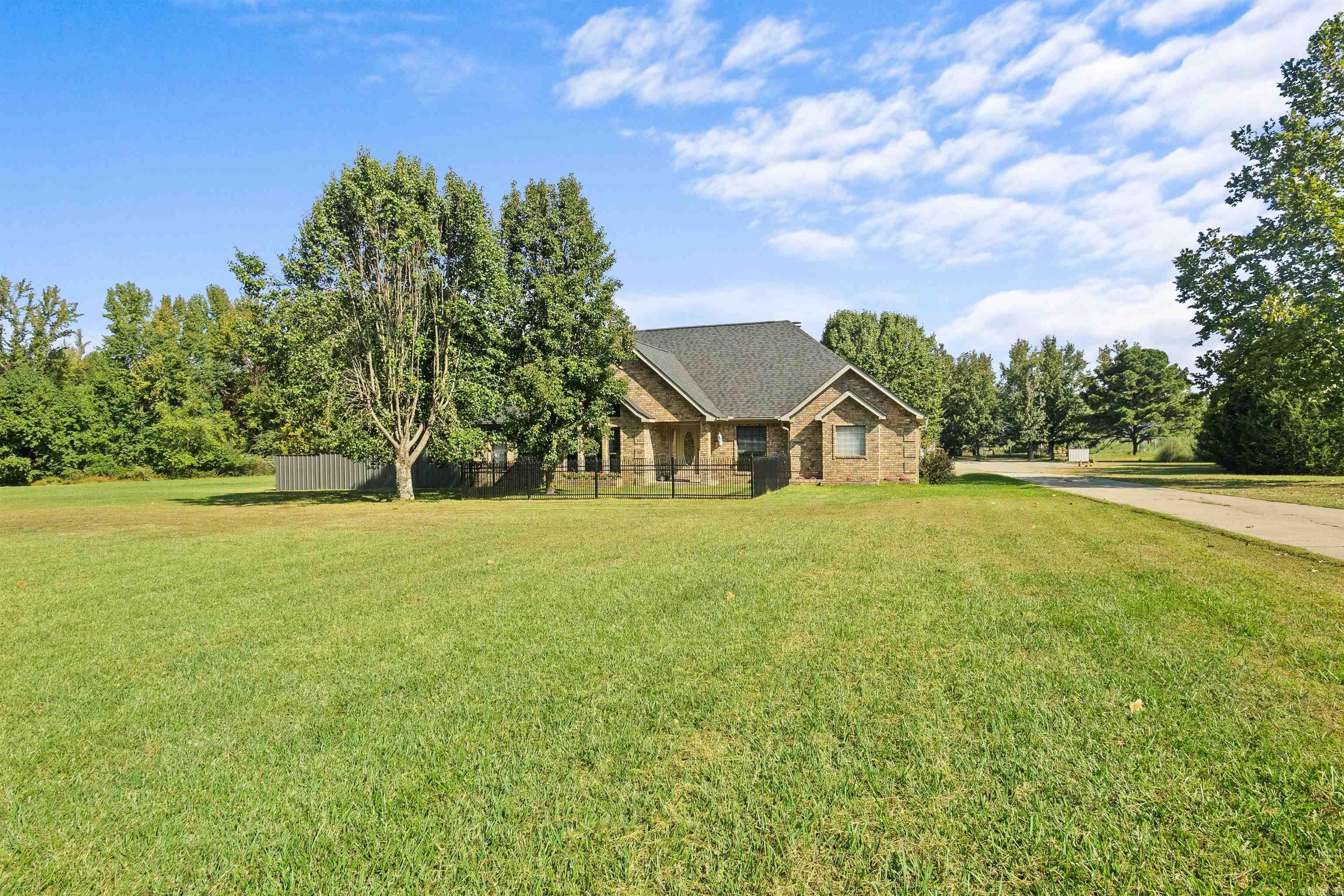 Gorgeous, well maintained home that checks all the boxes. Need In-Law quarters? Got it. Want a pool? Got it. Gameroom? Got it. Metal buildings? Got em. This 4 bed 3 bath home sits on 5 acres just outside of Jacksonville city limits. Easy access to Little Rock Air Force Base and I 57. New roof(2025) new flooring(2025) fresh paint(2025). Three large shops plus a plumbed concrete slab would be ideal for a small business. You simply need to see it in person to grasp it all. Give me a call to schedule a private showing.