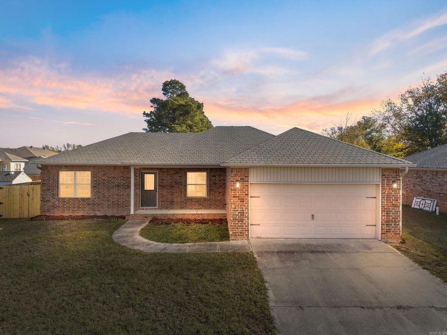 What a great opportunity to own a FOUR BEDROOM home in the Cabot School District that has been beautifully remodeled! New luxury vinyl flooring, new paint, new fixtures. This home has great curb appeal, and a nice front porch that is perfect for enjoying your morning coffee. Open concept floor plan with a large kitchen, dining area, and living room with custom tray ceilings. Granite countertops in kitchen with all new appliances. Split floor plan. Nice primary suite with tray ceilings, a jetted tub, custom tile work, and a huge closet! The other three bedrooms are on the other side of the home.  The front bedroom would be a perfect office with walk-in closet. Fully fenced back yard with concrete patio for grilling and relaxing with friends after a long work day. BRAND NEW HVAC UNIT! 2 car garage with NEW WATER HEATER. This is a showcase home that is MOVE-IN-READY! Great location with easy access to 67/167, schools, and all the great restaurants Cabot has to offer.