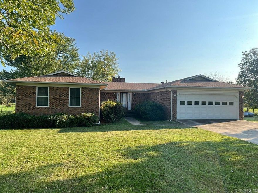 How about your very own mini-ranch conveniently located between Batesville & Cave City? Come see this BEAUTIFUL 22.5 acre farm featuring two barns, two ponds, a creek, live spring, and lush pasture. It is fenced/cross-fenced and ready for your livestock. At the end of the driveway lined w/ beautiful towering trees is a ONE OWNER, well maintained, brick 3BR/2.5BA home, feat a cozy wood burning fireplace, large pantry, a sunroom that can easily be used as a 4th BR, formal dining, or office; a 2-car garage, nice double pane windows, a GE home generator system, & new shingles as of 10/2024. Outside is a variety of mature trees for shading, and a storage shed in the back yard. Use your imagination to bring your own style to this unique, well kept home built in 1987 to make it your own