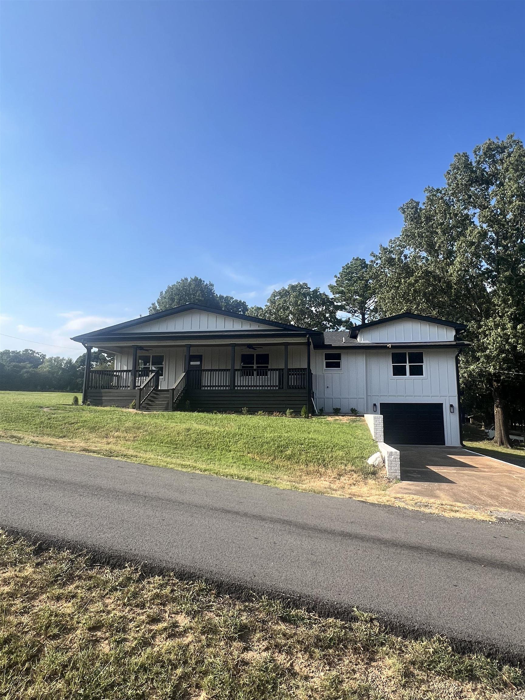 Beautifully remodeled home sitting on two lots with 3 bedrooms and 3 full bathrooms plus a bonus room! Tongue & groove ceiling in the living room and on the huge front porch! Kitchen features include all new appliances with a gas cookstove, new cabinets, coffee bar & quartz countertops. Gorgeous master bath & so much more.