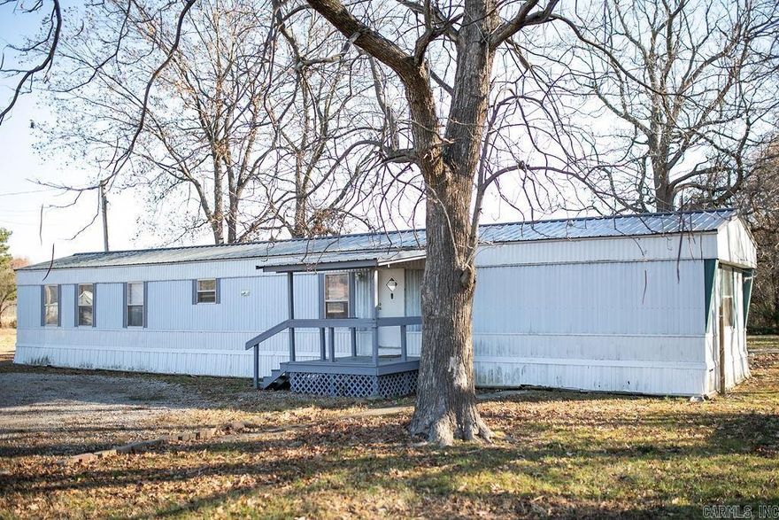 This home offers a unique opportunity for investors seeking a property with a generous lot size and consistent rental income. The lot is large enough for an additional income producing property to be added. Rents through HUD for $1025/month. Now offering rent to own option with down payment.  Call your favorite agent for more information on rent to own.